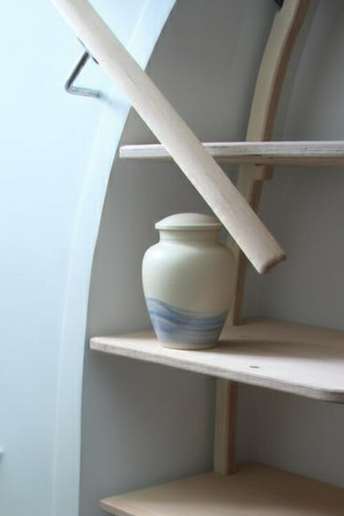 Urn on a shelf Urn on a shelf